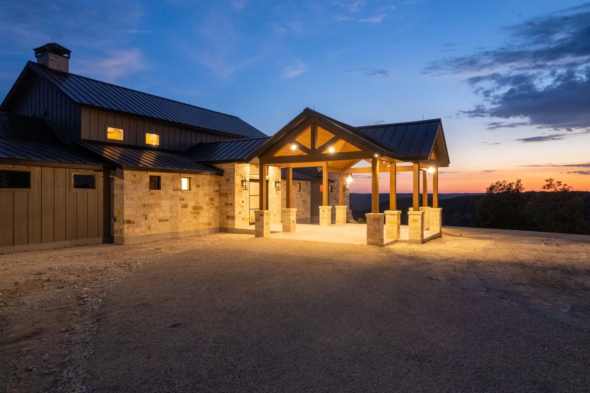 Ranch-style custom home in Kerrville at dusk